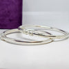 Contemporary Oval Sterling Silver Bangle