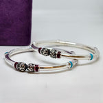 Contemporary Oval Sterling Silver Bangle